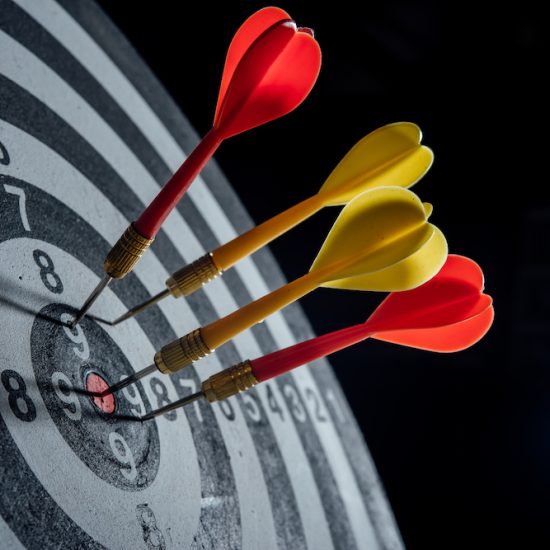darts arrows in the target center business concept darts arrows in the target center business concept